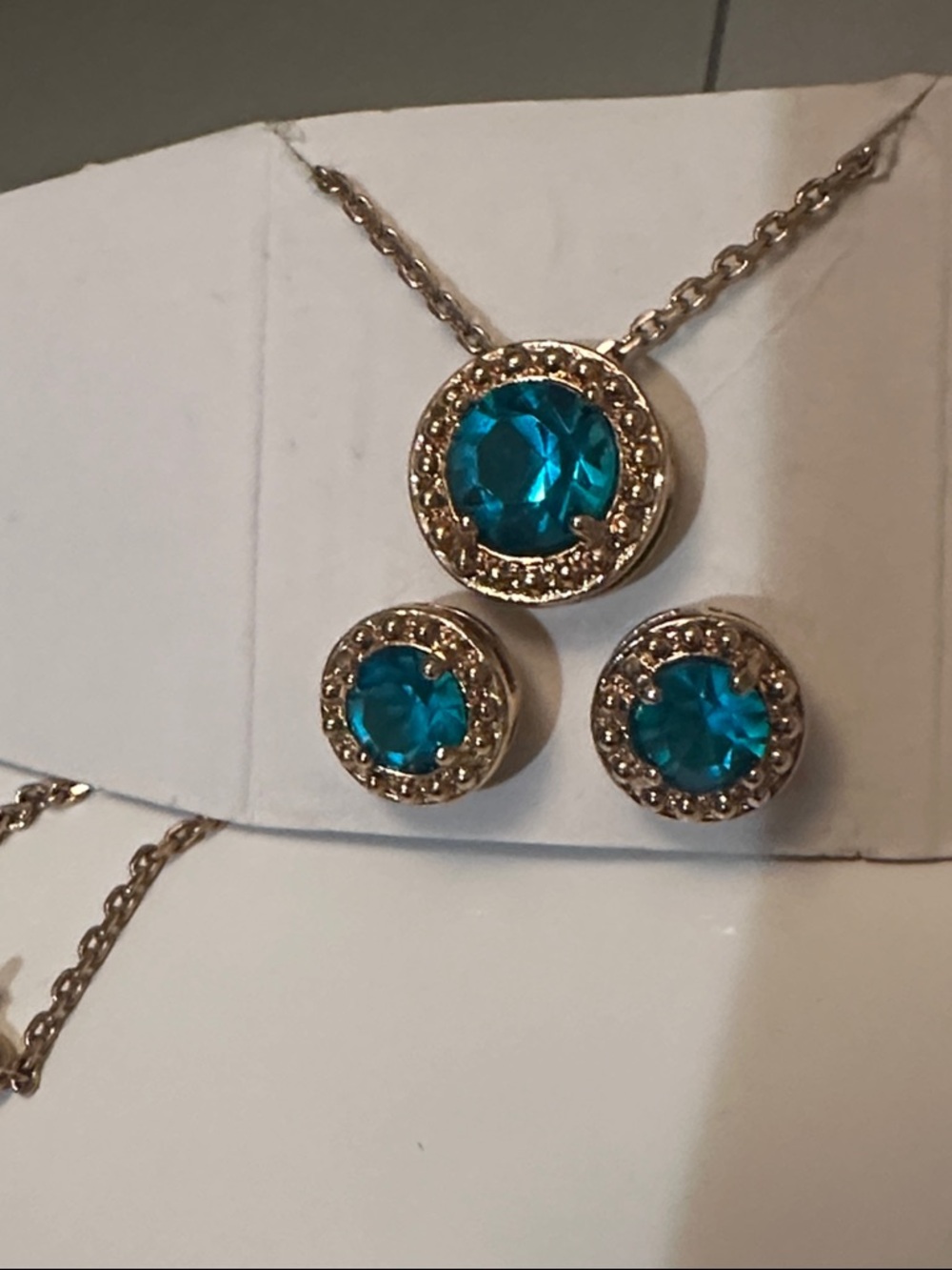 Avon Gold-Tone Necklace and Earring Set with Teal Blue Crystal. Like New.